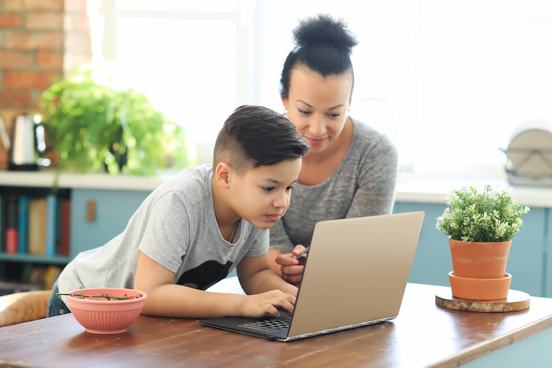 child learning to code at home