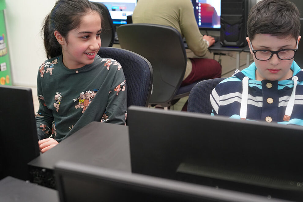 girl looking at another student